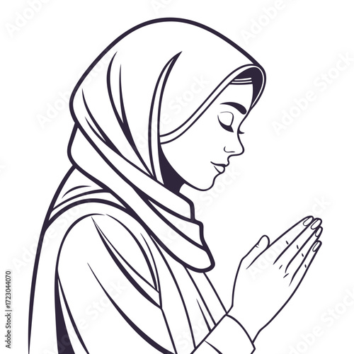Profile of a Praying Muslim Woman in a Hijab