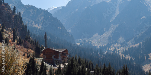 A house in the mountains, a landscape with a secluded house on the mountainside, a vacation in a villa in the mountains