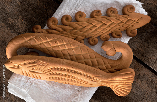 Mostaccioli from Soriano Calabro in the province of Vibo Valentia, Calabria, Italy, are sweets hand-shaped by local artisans who give them anthropomorphic, zoomorphic and ichthyomorphic shapes