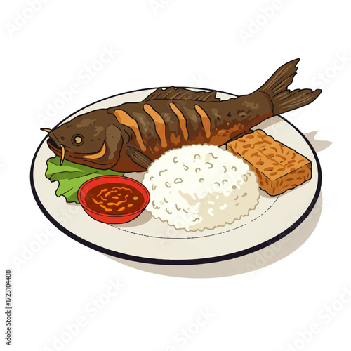 Delicious fried fish served with rice, sambal, and tempeh on a plate