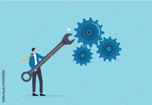 Adjustment and optimization for business improvement, change or fine tune for smooth ride, repair and maintenance service concept, businessman holding wrench to adjust gear cogwheels setting.