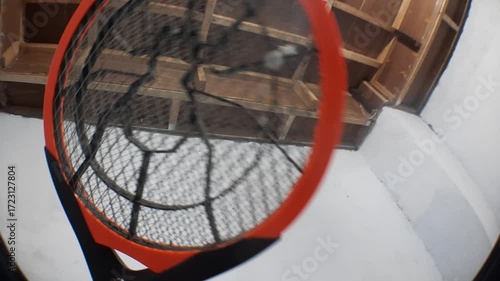 A person is using a mosquito racket to reduce the mosquito population in his room.