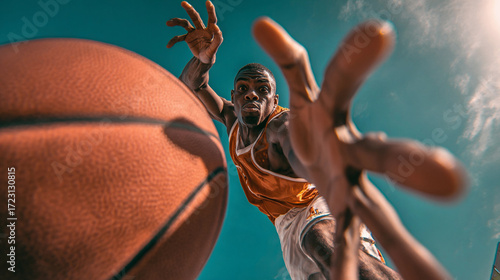 Man shooting basket ball close up view