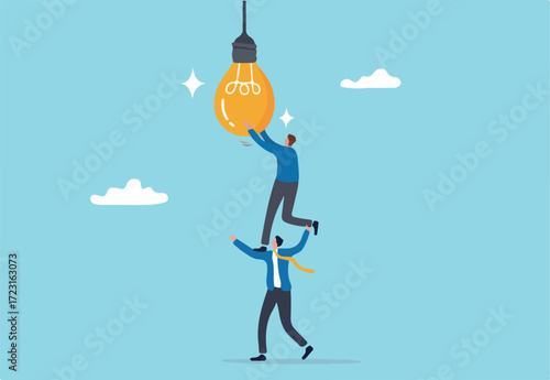 Partnership to success together, teamwork help get solution to solve problem, support to togetherness, collaboration and cooperation concept, businessman help support coworker to turn on lightbulb.