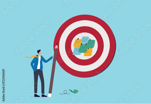 Goal setting, achievable target or purposeful objective, mission to accomplish or challenge to win for business success concept, businessman write down goal on notes and put on big dartboard target.
