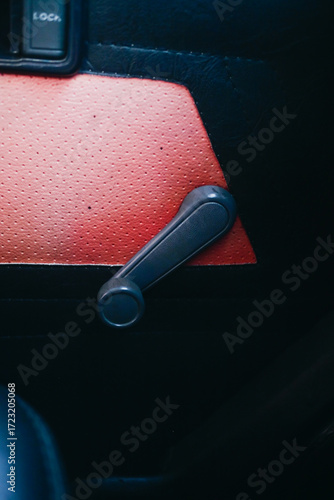close up of manual power window lever car