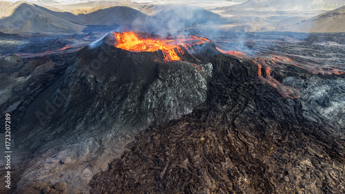 Epic aerial panorama of an Icelandic volcano crater surrounded by vast lava fields.
