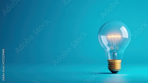 Modern Light Bulb on Vibrant Blue Background Representing Innovation and Creativity