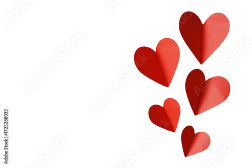 Elegant red paper hearts float creating romantic modern feeling