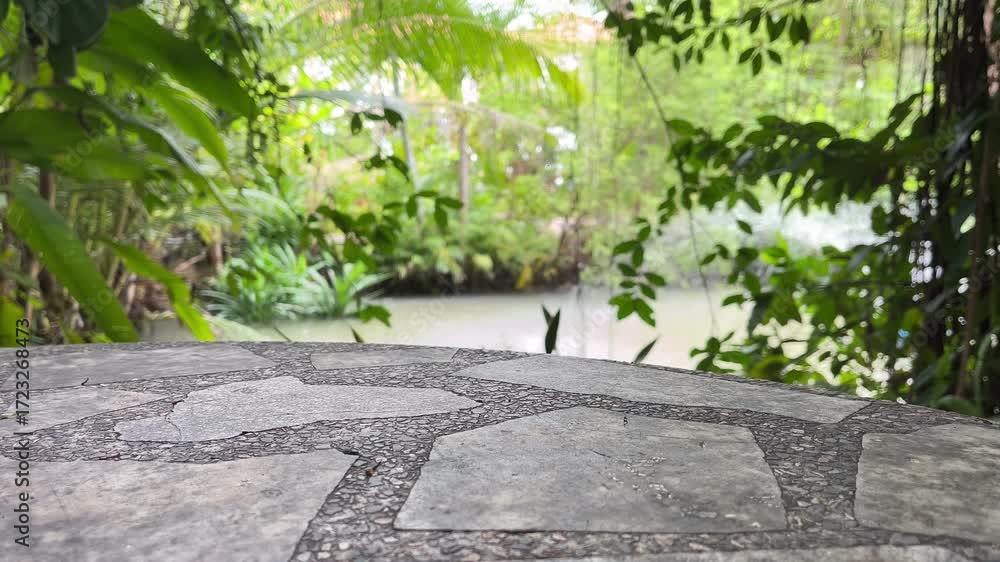 Stone podium in natural green background for empty show for product and presentation
