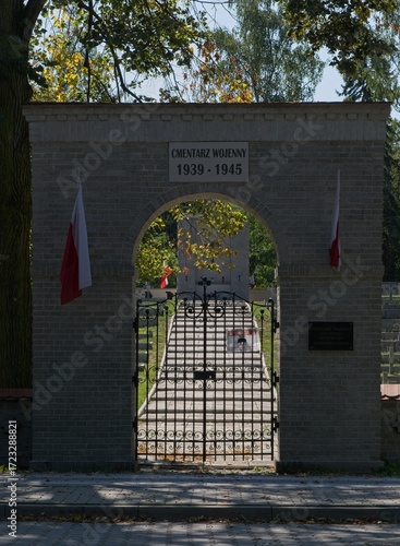 Laski, Poland - Sep 12, 2025: This war cemetery in Laski contains 837 Polish graves from the Second World War. Sunny summer day. Selective focus