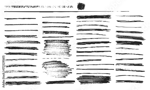 Set of grungy ink and marker brush strokes in various textures and thicknesses on white background