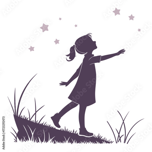 Silhouette of a young girl reaching for stars on a grassy hill dreaming of the cosmos