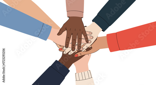 Diverse hands stacked together in unity and teamwork.