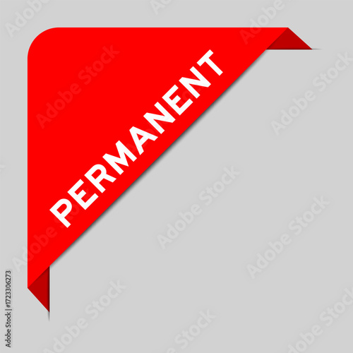 Red color of corner label banner with word permanent on gray background
