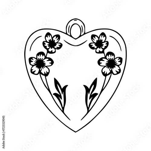ornate heart pendant with etched flowers