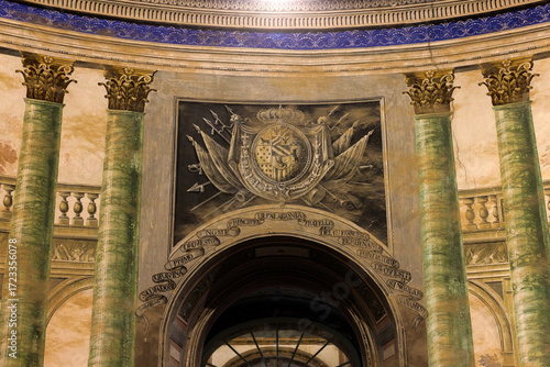 Fotografie Painted family coat of arms on the central wall of the elliptical vestibule in V