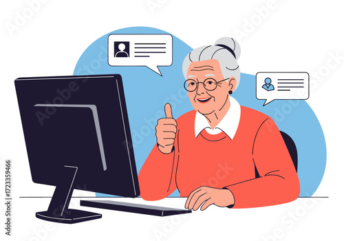 Elderly Woman Using Computer Giving Thumbs Up.