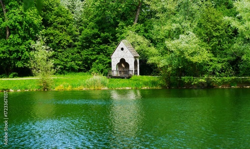 Little fisherman house by the peaceful green lake lake, Zagreb, Croatia