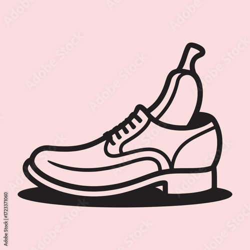 Black outline of a dress shoe with a banana inside on a pale pink background footwear fruit