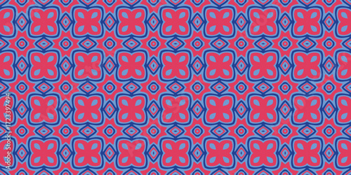 A seamless repeating geometric pattern featuring vibrant pink and blue floral motifs within a grid structure.