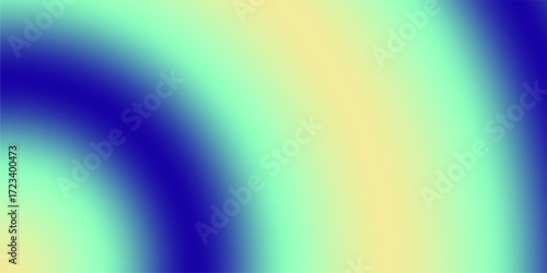 Abstract radial gradient transition from deep blue to bright yellow and light green tones.