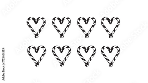 Festive heart shaped candy canes arranged for holiday celebration or valentine's day sweet treat concept silhouette