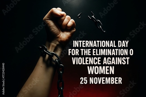 Fist breaking chains symbolizing freedom from violence against women on november 25th