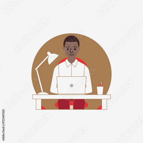 Dark skinned man working remotely from home using laptop computer