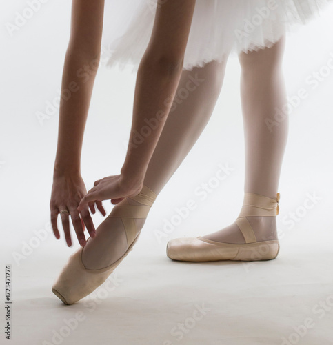 Young ballerina in white ballet tutu