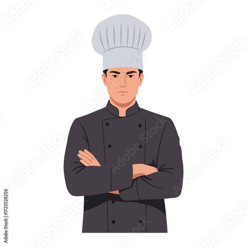 A professional chef in a black uniform and a tall white hat, arms crossed, looking at the viewer.