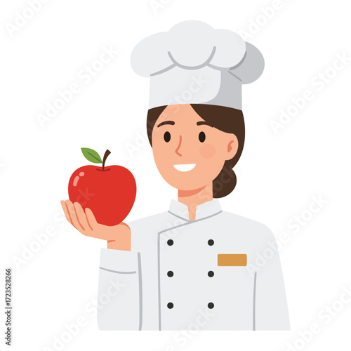 Chef holding a red apple in her hand, wearing a white uniform and hat.