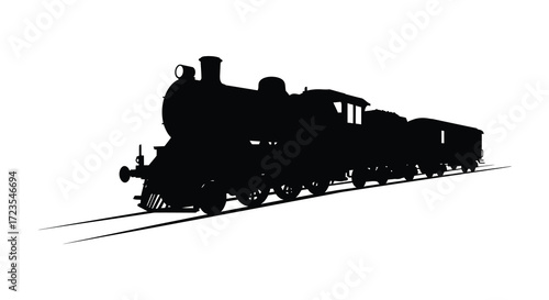 Vintage steam train on railway tracks a dramatic black silhouette