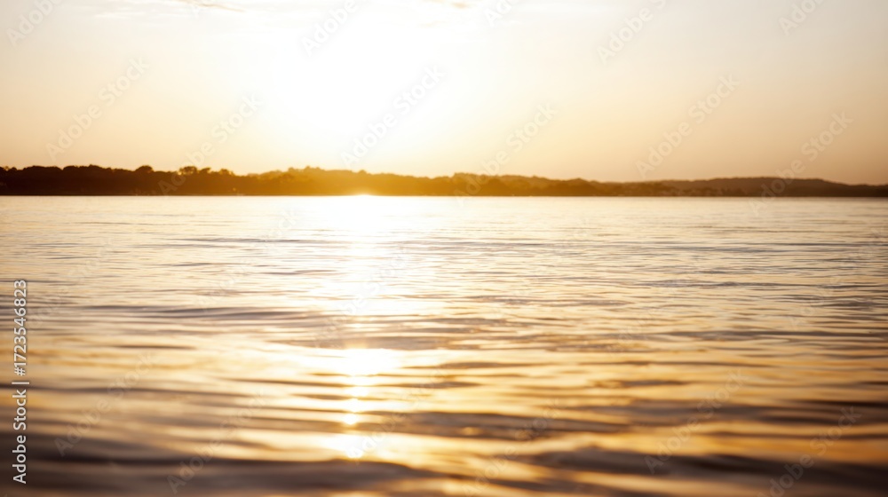 Fototapeta premium shore. Tranquil lakeside view at sunset with calm water reflecting golden hues. inspiring travel planning, travel magazines, designed for outdoor magazines and nature guides.