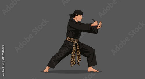 Silat Martial Arts Practitioner Demonstrating Defensive Techniques in a Combat Stance