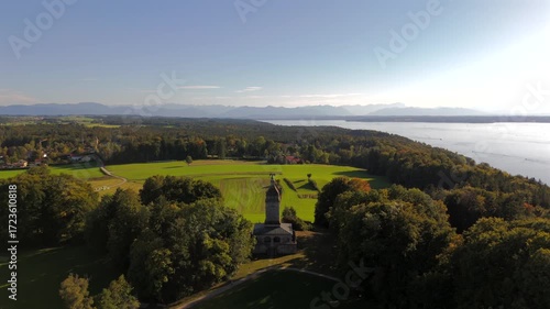 Drone shot aerial landscape Bismarckturm Assenhausen at Starnberger See Bavaria. Historic landmark, cultural heritage monument and sightseeing destination in Germany