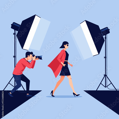 Fashion photographer taking picture of model on runway