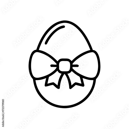 Decorative egg with bow and ribbon as Easter symbol  