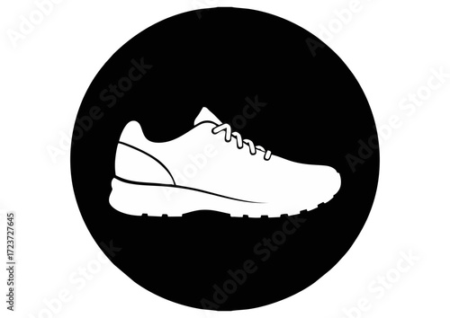 Black silhouette of a running shoe on white background for fitness and athletic concept
