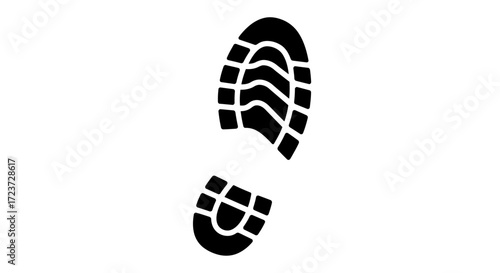 Close-up view of a black silhouette of a shoe print.