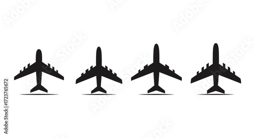 Four silhouettes of passenger airplanes flying in formation top view vector