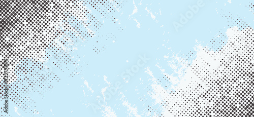 This background image features a light blue canvas with distressed, paint-like textures, accented by black halftone patterns in the corners, creating a visually dynamic design