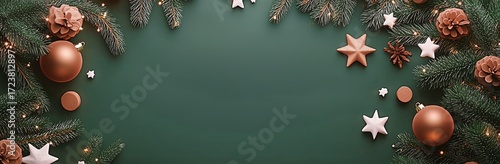 Festive Decorations With Pine Branches and Ornaments on a Green Background fo...