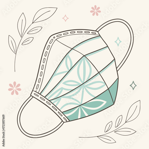 A stylized face mask with floral pattern
