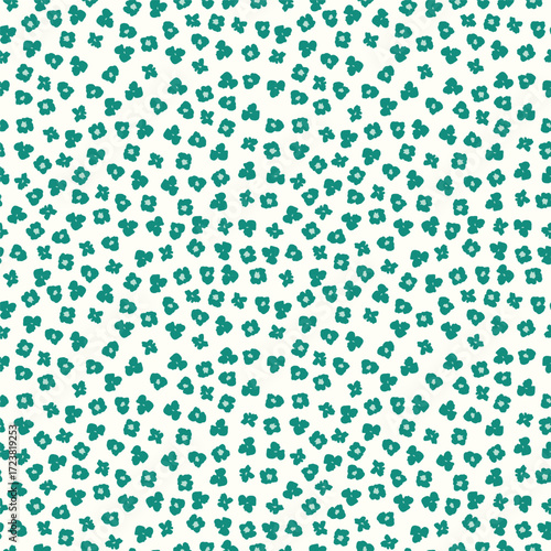 Minimalist ditsy floral seamless pattern. Simple abstract microprint with tiny teal flowers on a white background for modern fabric, chic stationery, and home decor.