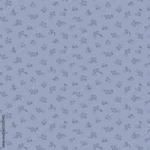 Elegant tonal floral seamless pattern. Subtle monochrome ditsy background with a damask or jacquard effect in dusty blue for sophisticated wallpaper, fabric, and wedding decor.