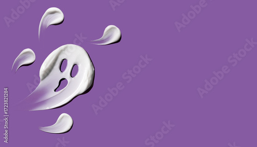 Halloween concept, ghosts in the form of cosmetic strokes on a purple background. Skin hydration in autumn. Autumn concept.
