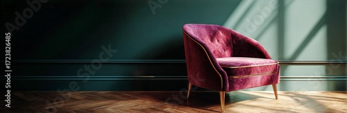 Comfortable Pink Armchair in a Stylish Room With Green Wall and Natural Light.