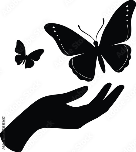 Silhouette of a hand gently releasing a butterfly symbolizing freedom and recovery from illness