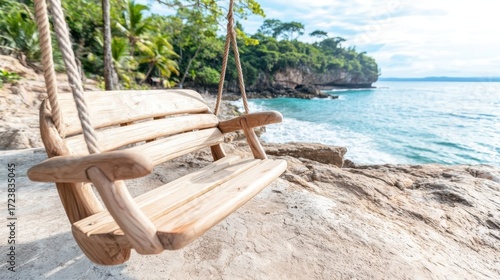 A serene wooden swing by the ocean, surrounded by lush greenery and the calming sound of waves, perfect for relaxation and enjoying nature.